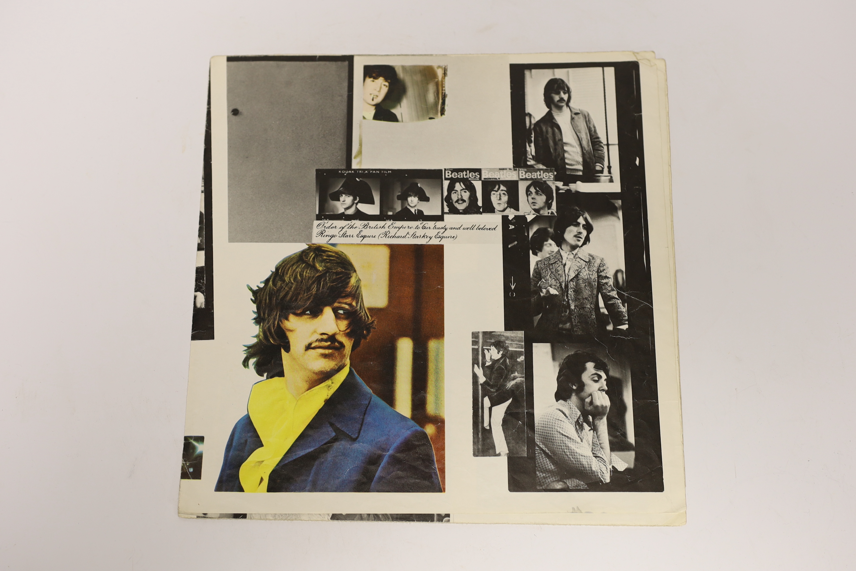 The Beatles; The White Album, top opening cover numbered 0557785, two LPs with set of four photographs and booklet, missing inner sleeves